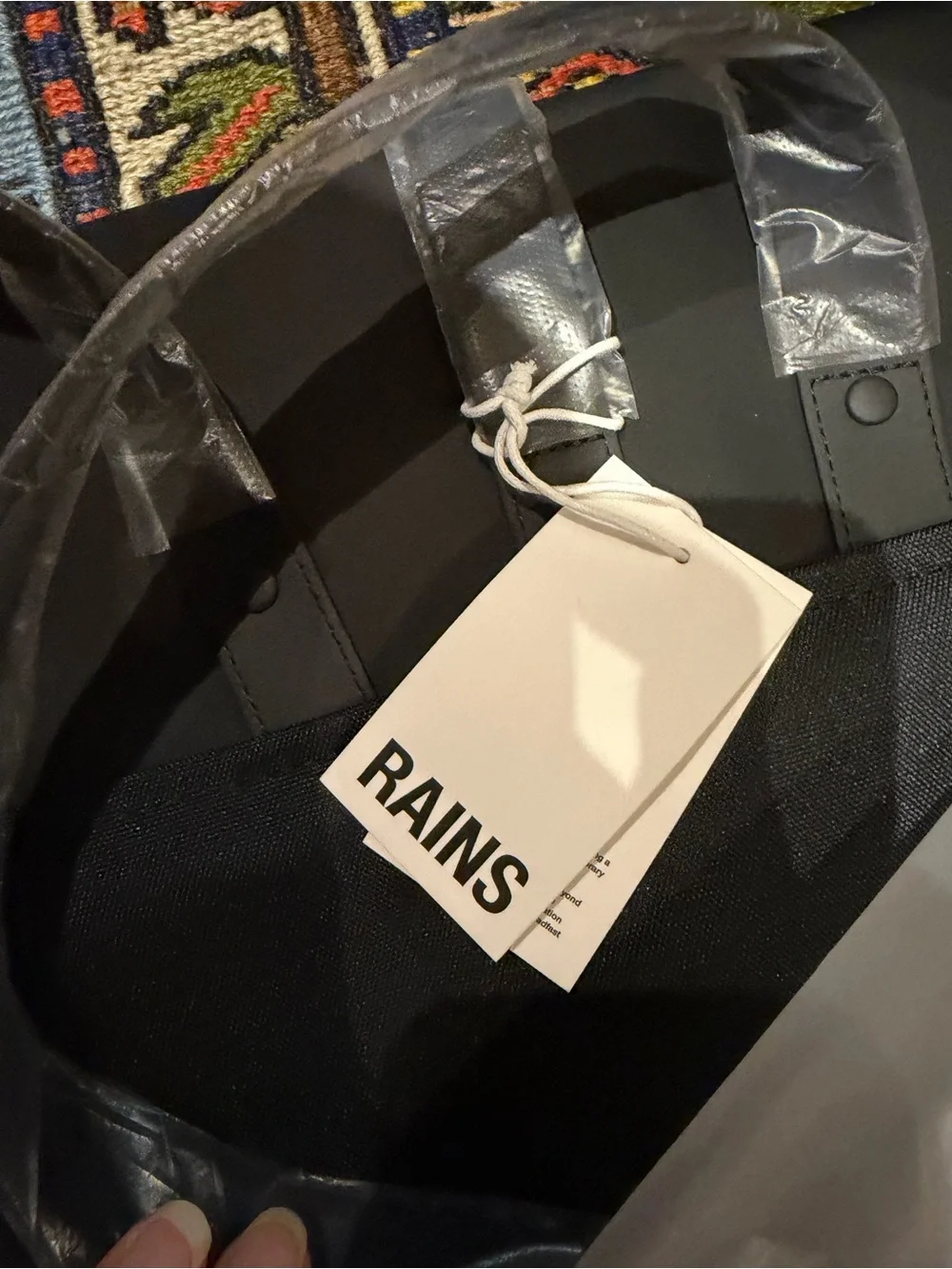 Rains Matte Black Minimalist Backpack